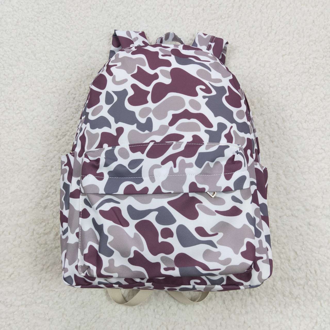 purple/blue Camo backpacks/duffles