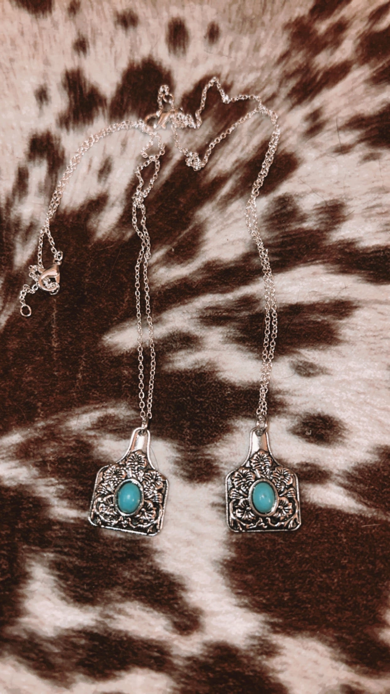 Turquoise center cowtag necklace